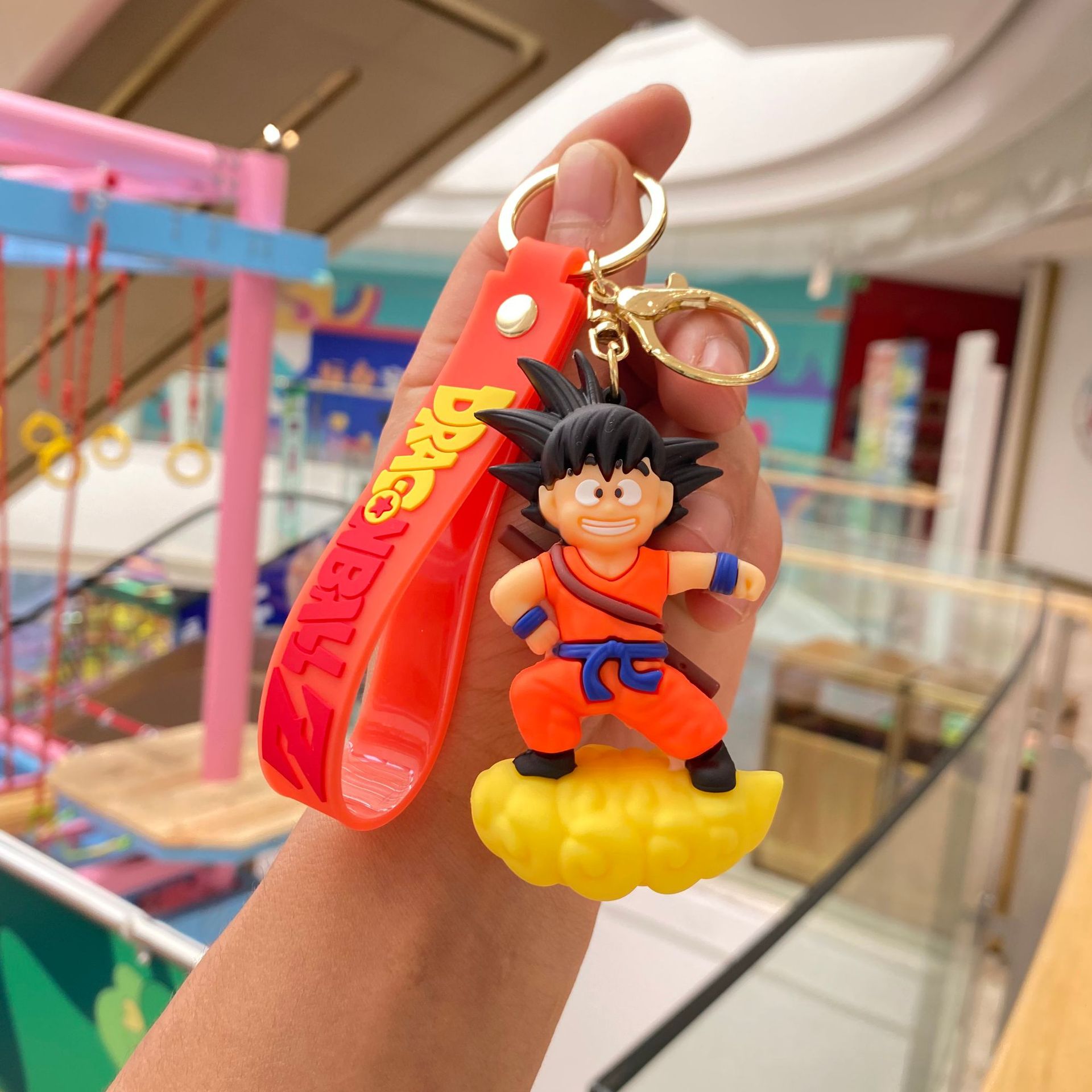 Llavero Dragon Ball-acero douyun ropa amarilla