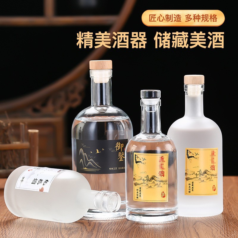 Botella de vidrio de vodka de alta calidad botella de vino de fruta cristal transparente de arena blanca dividida botella vacía con película de retracción térmica en stock