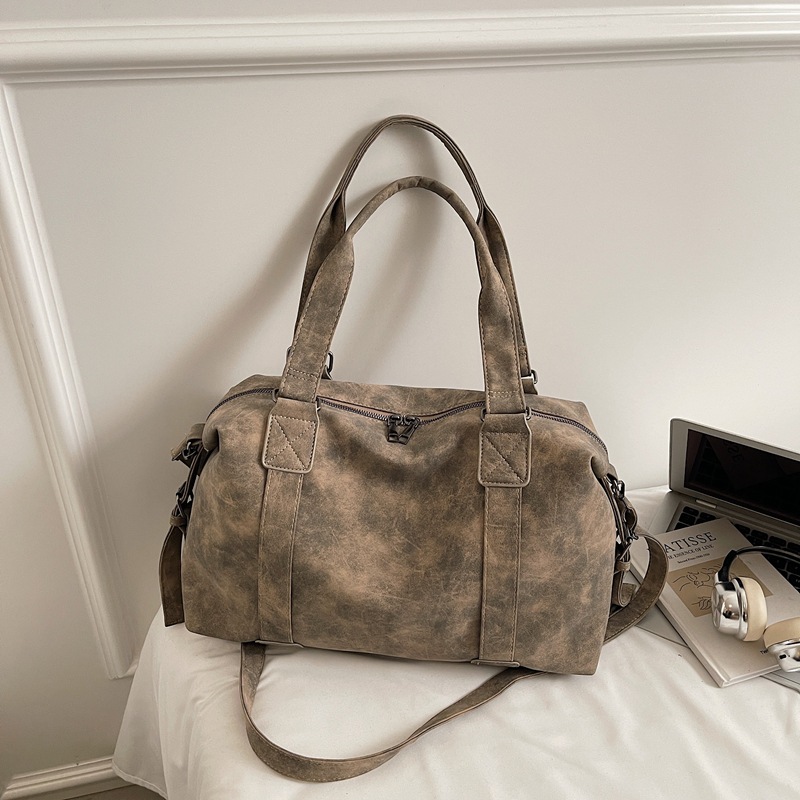 Bolsa de viaje corto de gran capacidad, bolso de mano, bolso de mano, mujer, 2025 nuevo invierno retro versátil, mochila de viaje