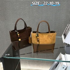 磨砂真皮手提水桶包女2025新款高级感通勤包麂皮绒斜挎包小托特包