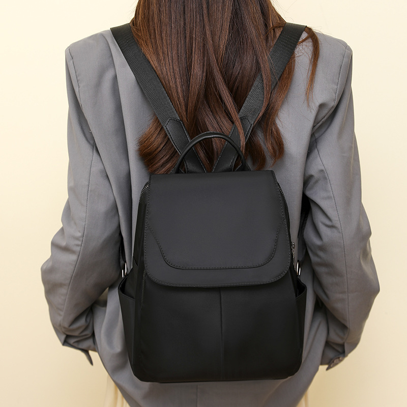 Mochila de tela Oxford para mujer 2024 nueva moda moda color sólido pu gran capacidad mochila escolar para estudiantes mochila de viaje para mujer