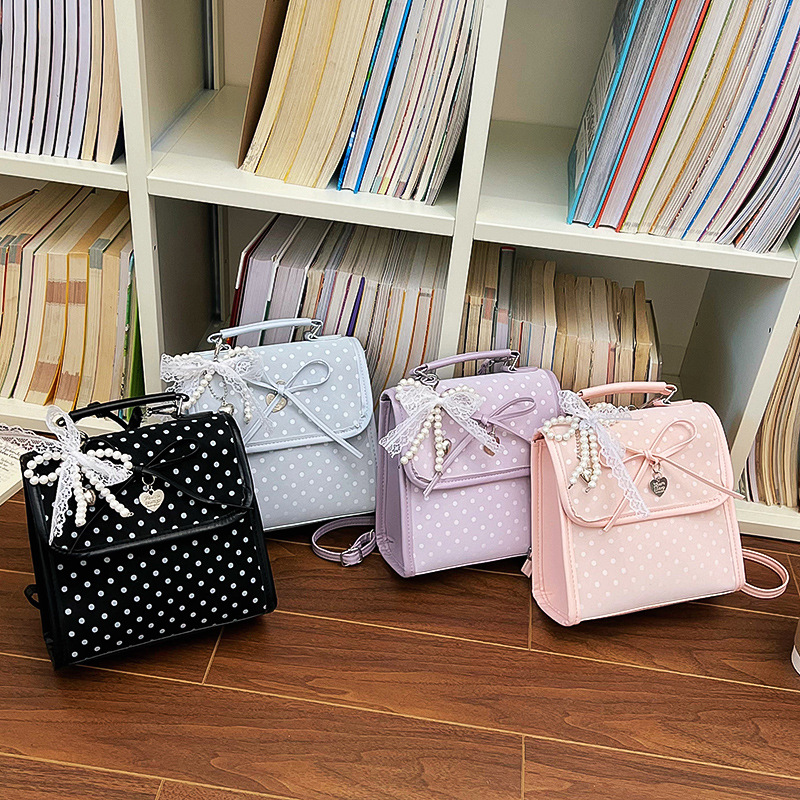 Bolsa de moda coreana lindas bajo las axilas 2026 primavera nueva bolsa de viaje simple, mochila de moda casual de alto valor.