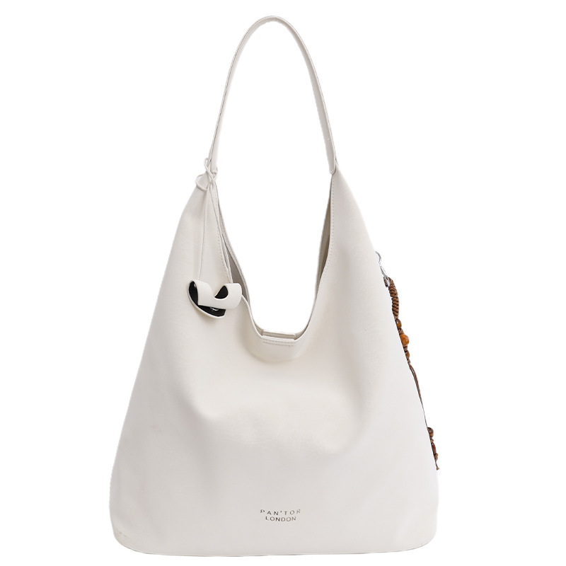 Transfronterizos de gran capacidad perezosa bolsa de viento para mujeres otoño / invierno 2025 nuevo retro moda brazalete nicho bolso de hombro