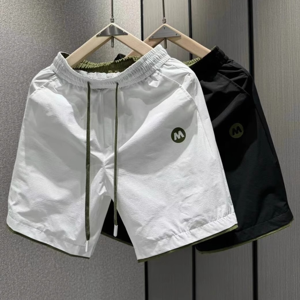 Pantalones de cinco puntos de estilo fino de la marca de moda, pantalones casuales, pantalones cortos para hombres, pantalones deportivos coreanos de secado rápido de verano