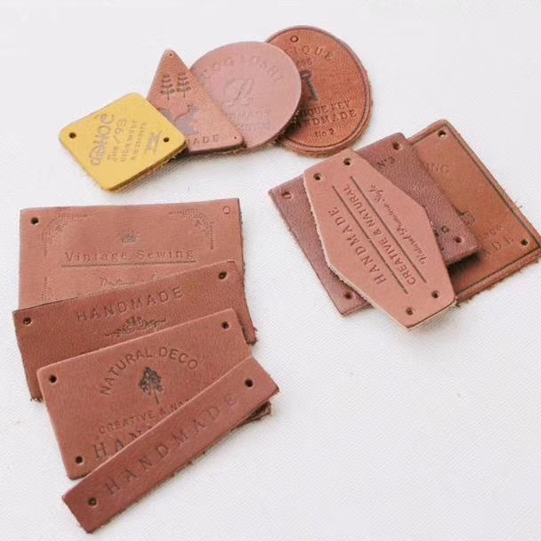 专业皮标生产 PU标 压印立体皮章  牛仔皮标 激光皮标 可设计拿样