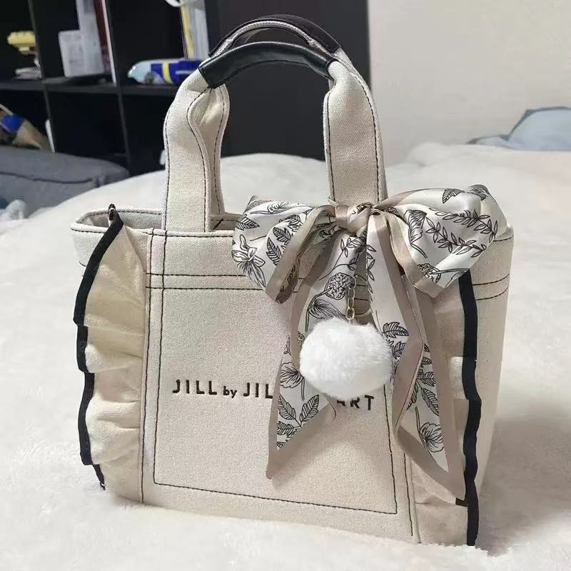 现货日系JILL荷叶边帆布包女生褶皱托特包大容量妈咪包通勤手提斜