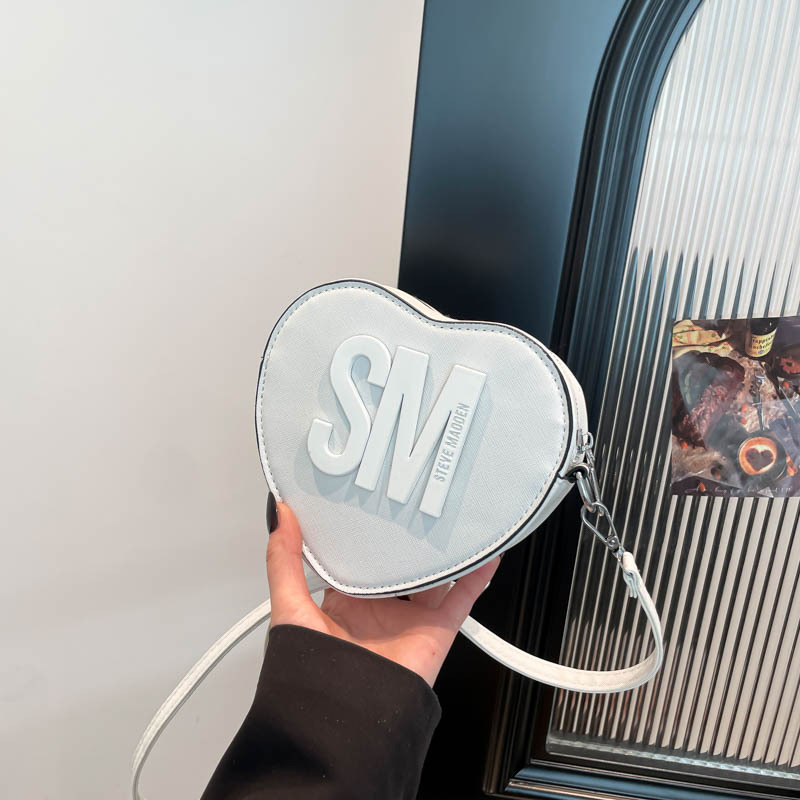 Bolsos para mujer 2025 Día de San Valentín Nuevo estilo Moda europea y americana Letras populares Color sólido Bolso en forma de corazón bags Bolso de hombro de moda