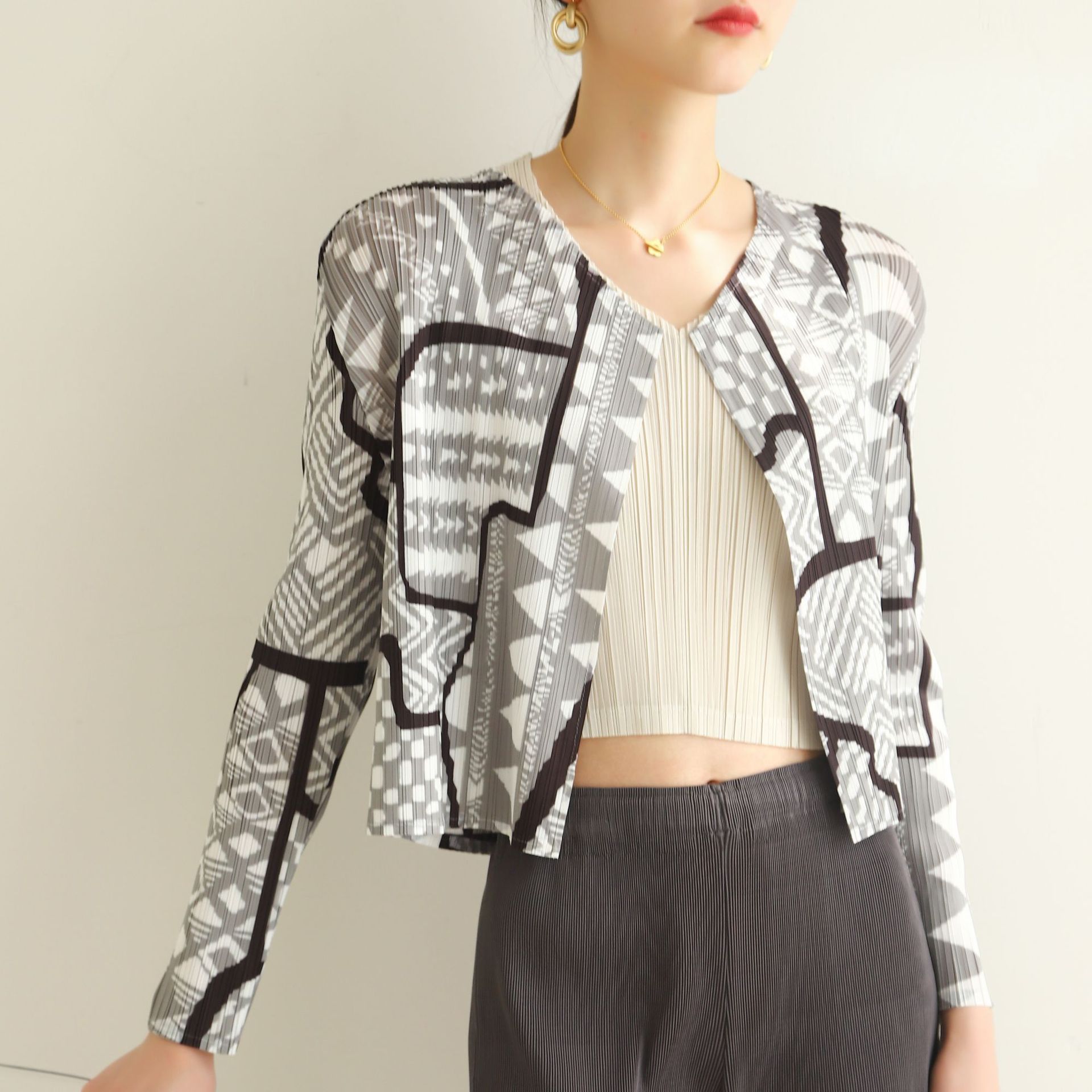 Contador de calidad otoño primavera Nueva gama alta plisado moda de la calle europea impreso cardigan versátil casual abrigo corto