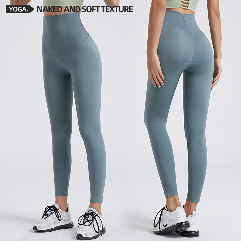 Primavera y verano nuevo yoga Barbie Pantalones de mujer de cintura alta estiramiento de una pieza medias deportivas desgaste exterior bottoming pantalones recortados