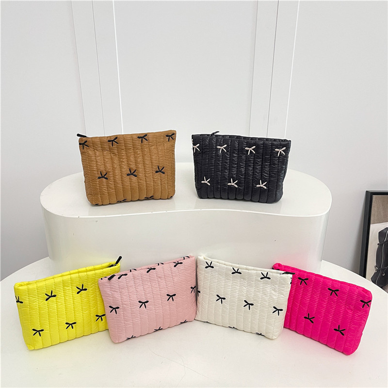 2025 invierno nueva moda portátil bolso de mano mecha de moda impresión mariposa de maquillaje de gran capacidad bolso de mano