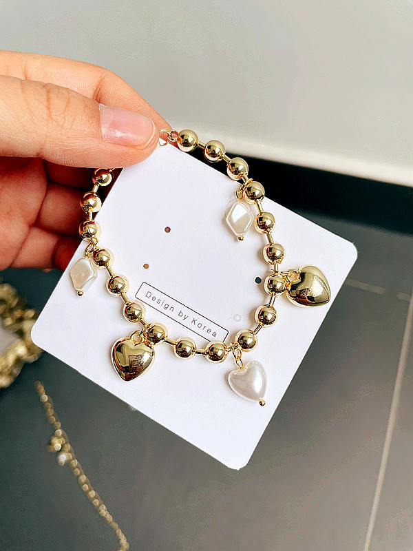 Korean Style Heart Gold Pearl Bracelet Wholesale display picture 6