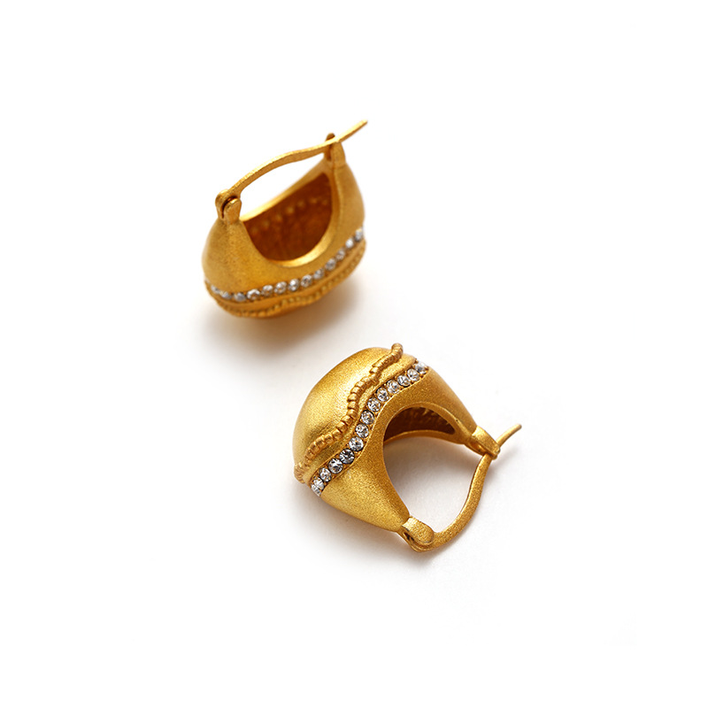 Cristal transfronterizo retro alta sensación latón chapado en oro goteo diseño de pendientes de diamante de estilo de moda