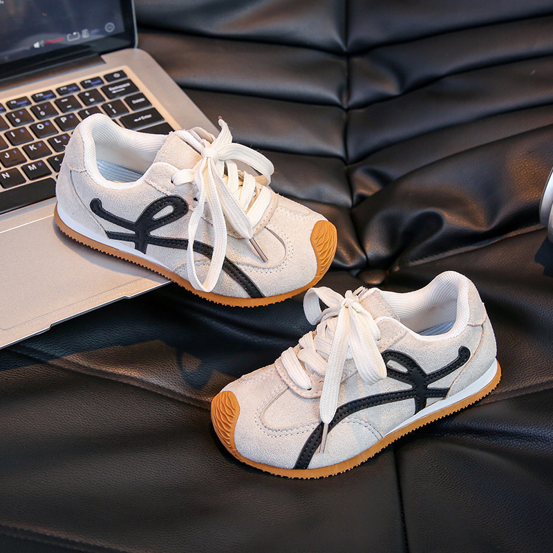 2025 primavera y otoño nuevos zapatos deportivos para niños de moda zapatos para correr retro para niños grandes y medianos