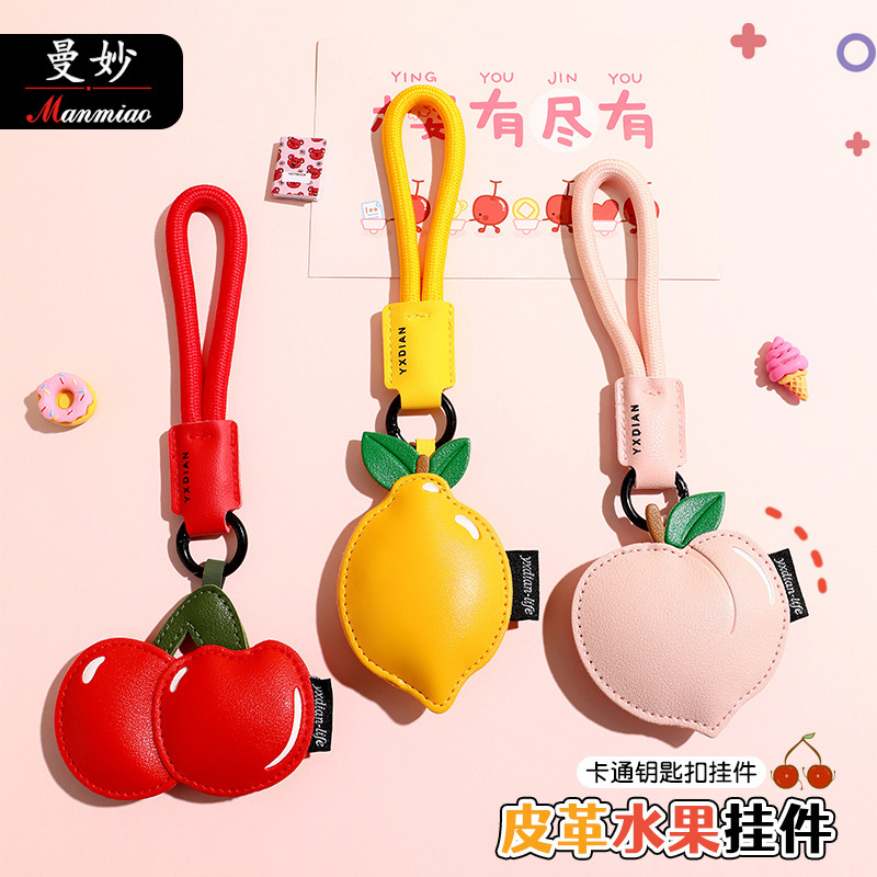 Cartoon PU leather cute fruit keychain fashion creative snake year doll car accessories exquisite pendant wholesale Cartoon PU leather cute fruit keychain fashion creative snake year doll car accessories exquisite pendant wholesale