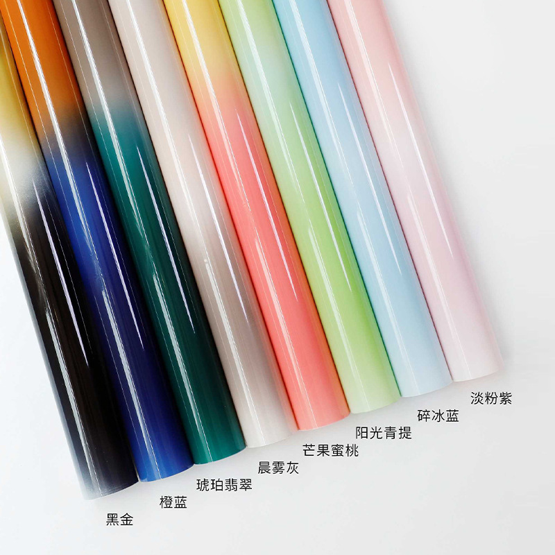 Gradiente de color celofán al por mayor fantasía caramelo flor papel de embalaje impermeable OPP cristal papel de embalaje translúcido