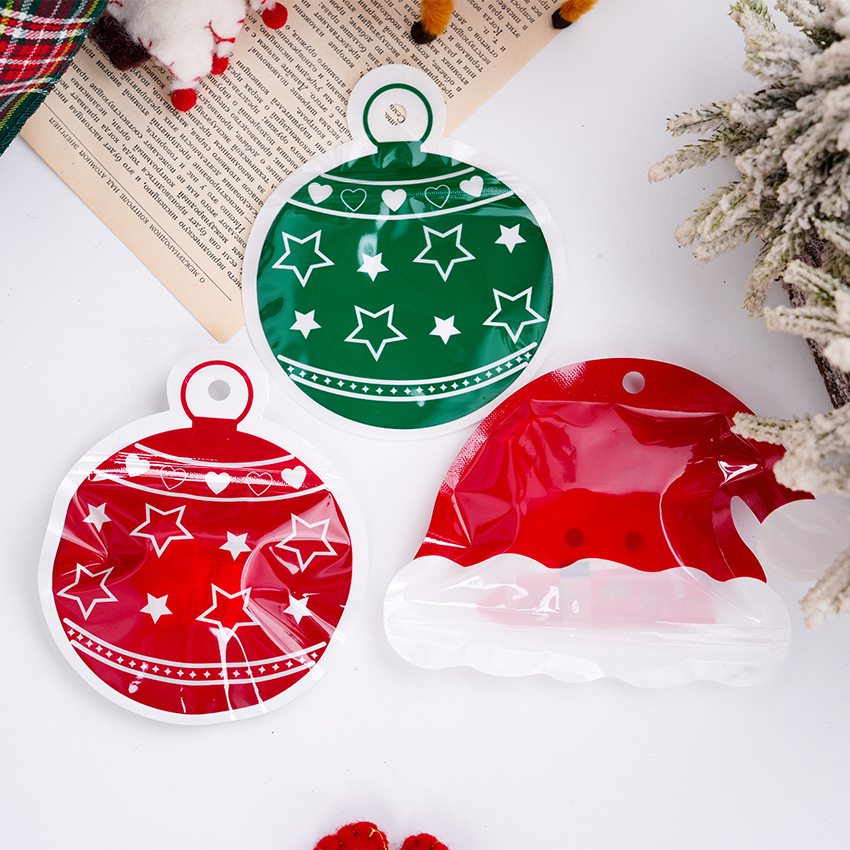 50个价 新款红色圣诞帽子款可悬挂带孔自粘袋 小礼物饼干曲奇包装