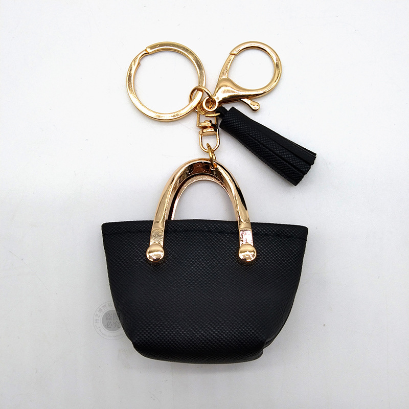 Llavero para mujer, bolso, colgante, joyería, mini monedero de almacenamiento de cuero lindo europeo y americano