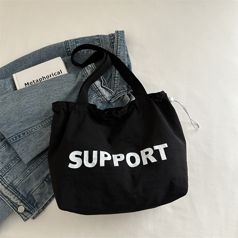 letras coreanas bolsas de lona para mujeres 2024 otoño nuevo relajado bolsas de clase de estudiantes universitarios de gran capacidad bolsas de nylon