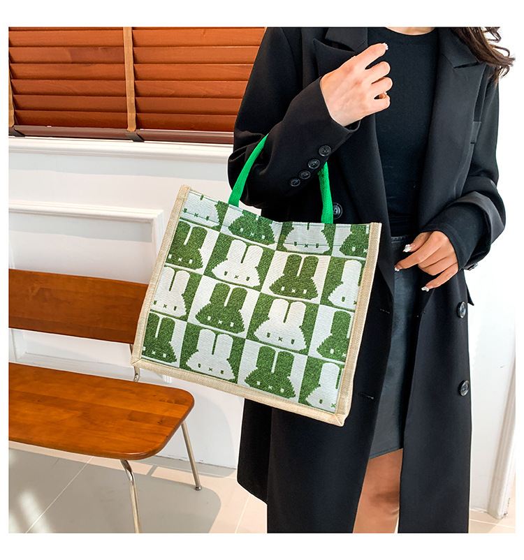 High-end mid-capacity canvas school commuting handbag 2024 new style fashionable and versatile linen single-shoulder tote bag undefined