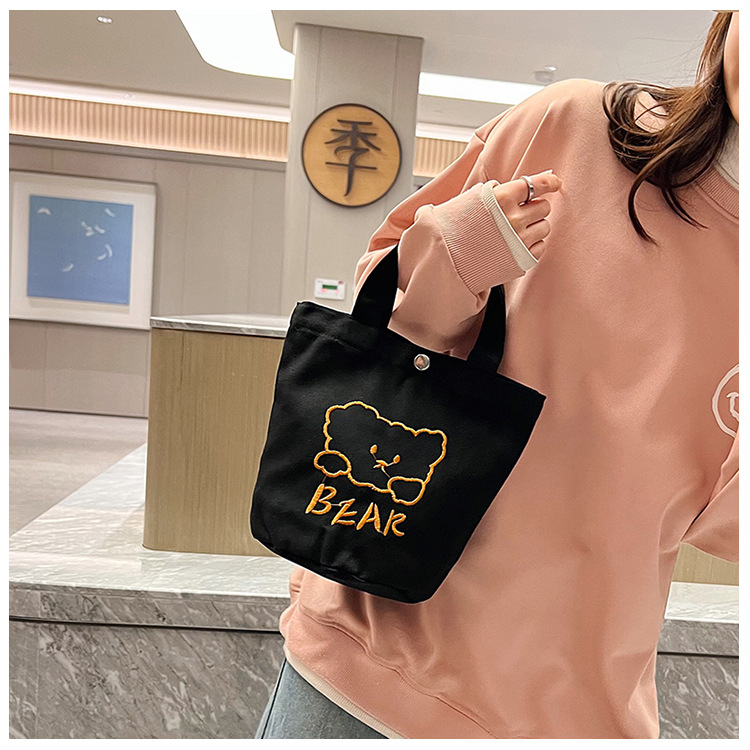Personalized ladies' bucket bag, versatile and cute canvas bear wholesale, simple Japanese style new handbag undefined