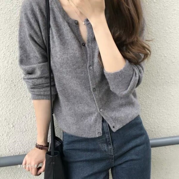Autumn purple knitted cardigan with a round collar