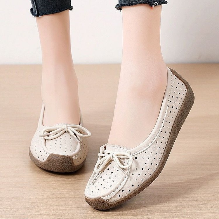 Zapatos de un pie Bean para mujeres 2026 nuevo verano hueco agujero respirable zapatos agujero antideslizantes con suela plana sandálias casuales