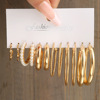 Golden metal retro brand earrings from pearl, European style