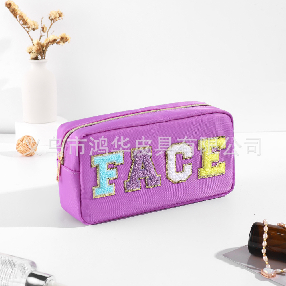 Transfronterizo amazon popular toalla bordada carta de nylon bolsa de cosméticos bolsa de almacenamiento de gran capacidad informal de las mujeres a prueba de agua