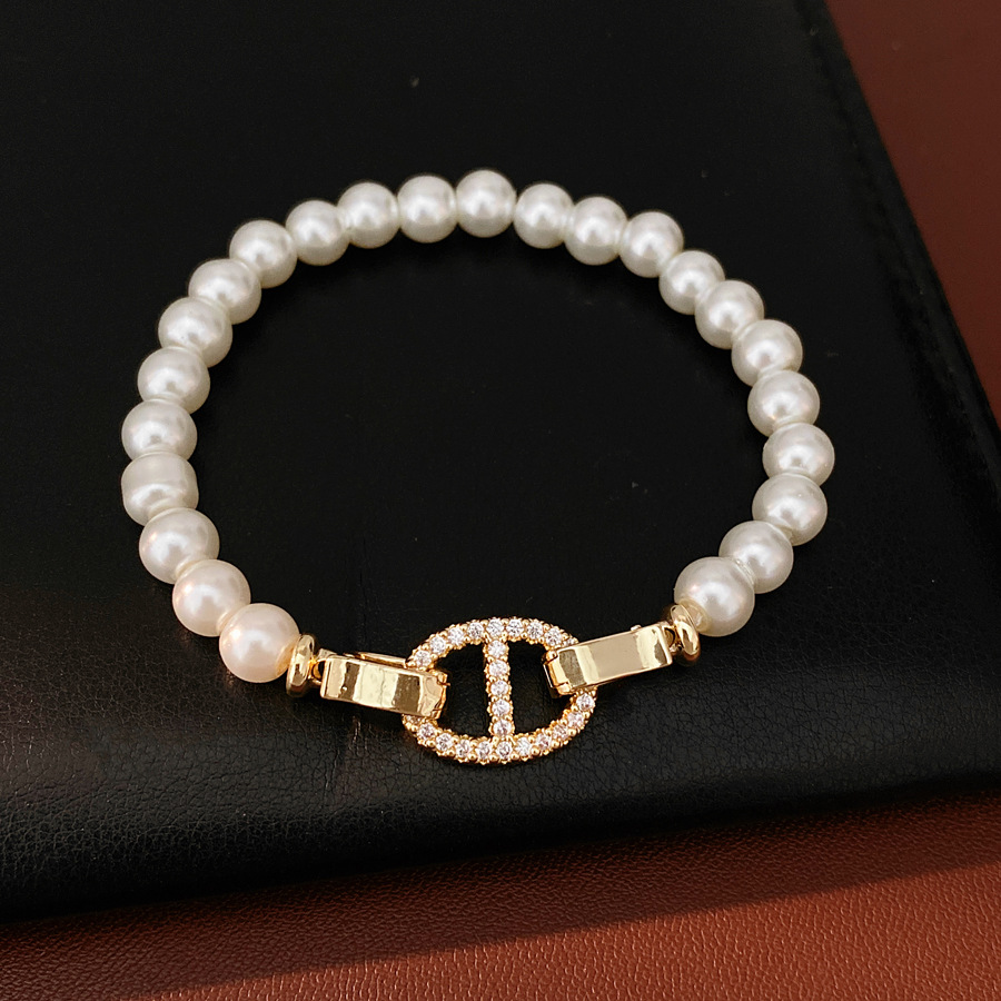 Pulsera de perla de nariz de cerdo de piedra de diamante redonda, pulsera ligera y lujosa, pulsera de nicho, joyas de moda versátiles.