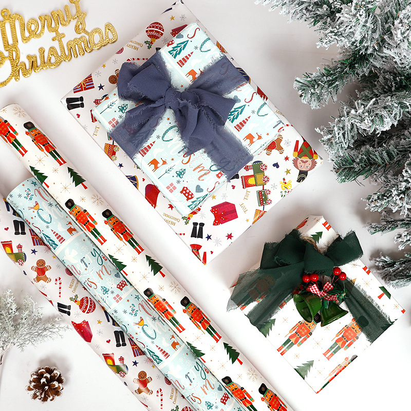 Amazon venta caliente super volumen de papel de embalaje de regalos de Navidad soldados Lollipop multicolor ciervo papel de embalaje de rollo