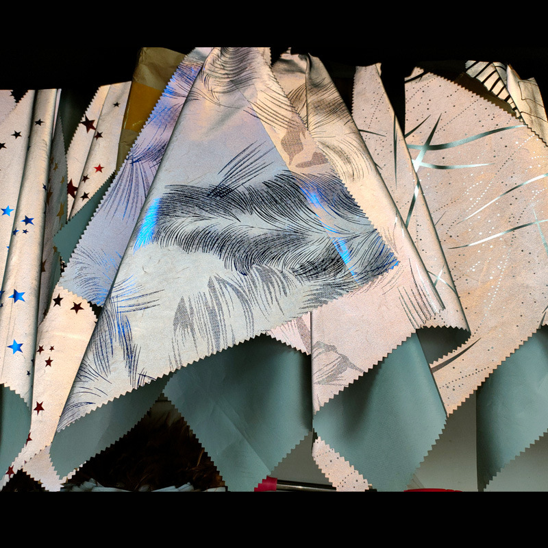 现货 耐刮耐水洗印花高亮化纤反光布舞台演出服 玩具用发光布面料