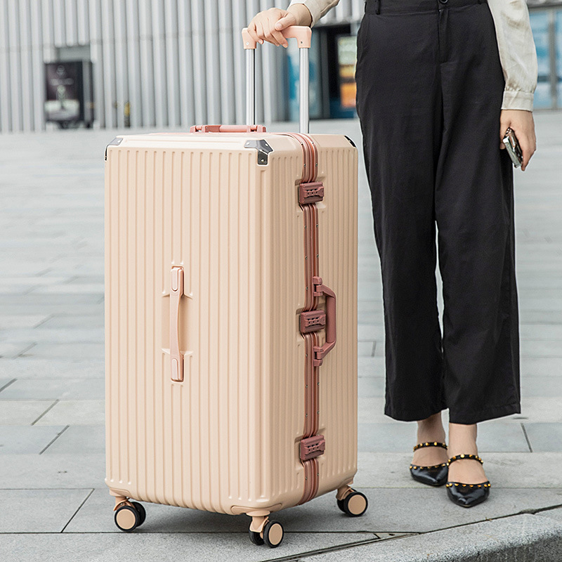 厳選されたアルミフレームとカップホルダートロリースーツケース学生大容量パスワードボックス小さな新鮮なスーツケース卸売