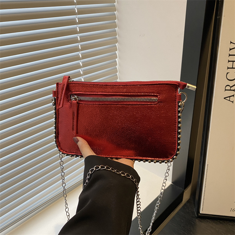 Casual coreano simple bolso de mano retrógrado personalidad bolso de mano para mujeres 2025 primavera nueva moda brillante bolso de hombro