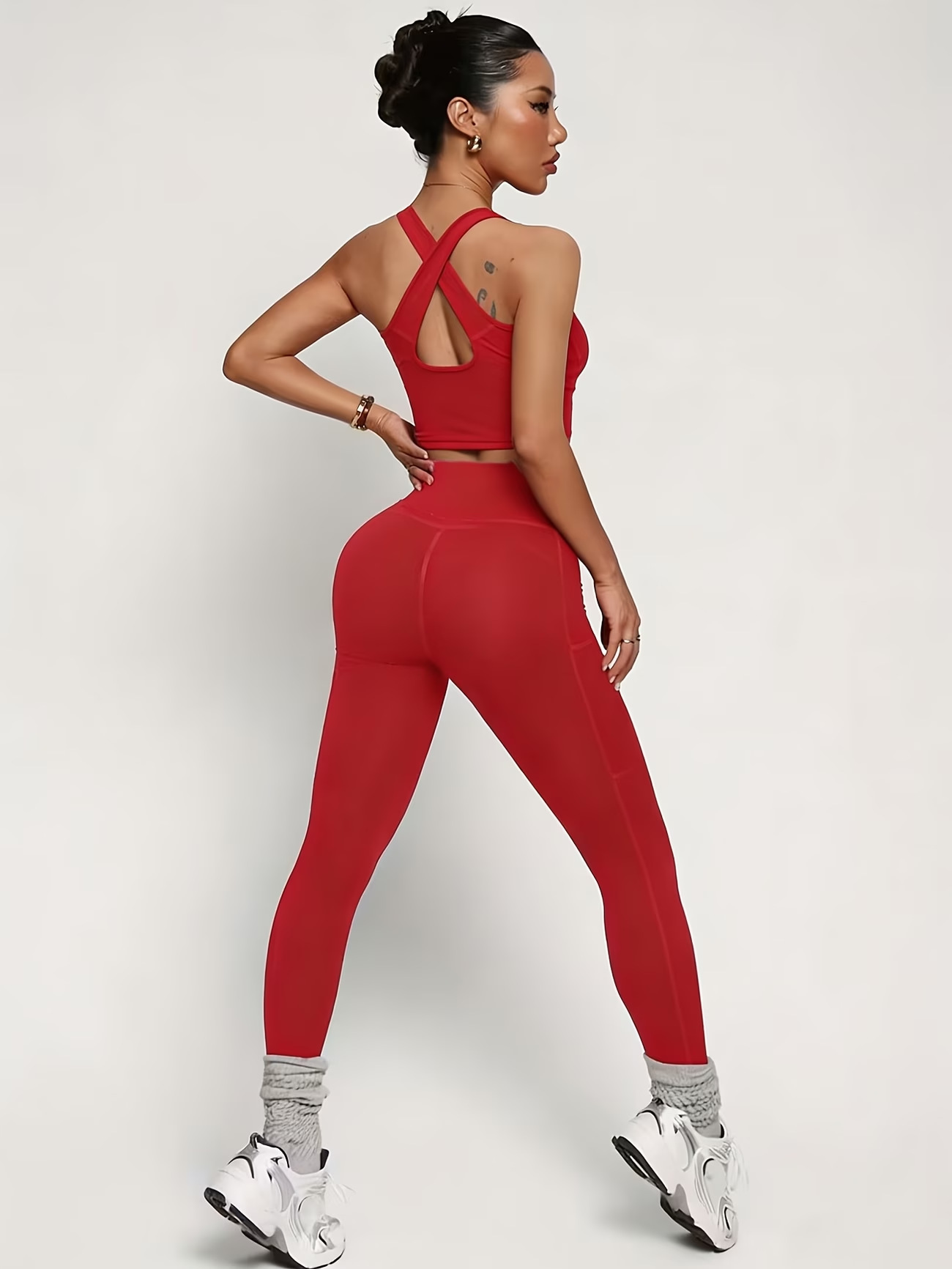 Trajes de yoga transfronterizos europeos y estadounidenses con espaldas apretadas para elevar las caderas trajes de deportes al aire libre para mujeres