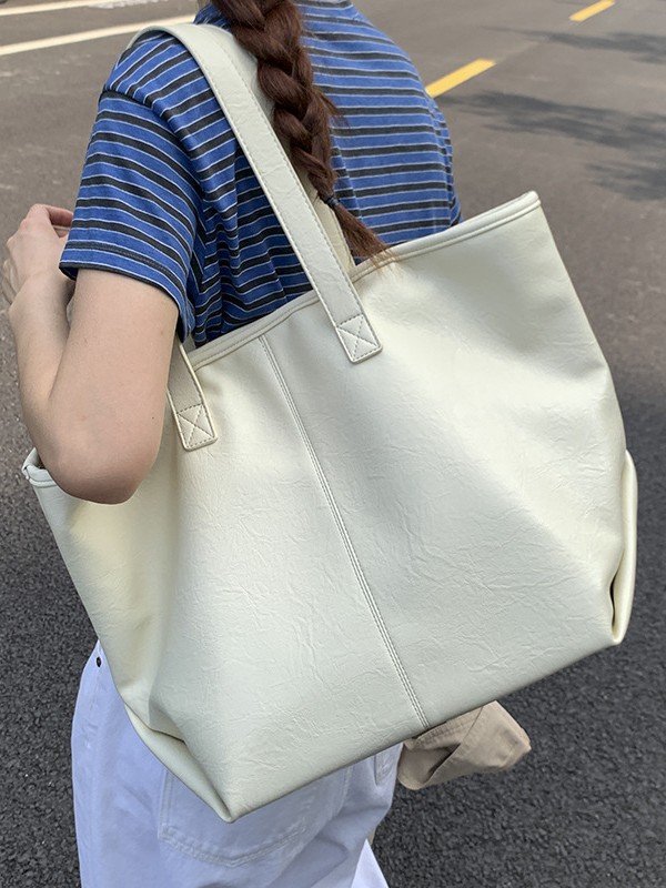 Bolsa de moda retro de gran capacidad para mujeres 2025 nueva simple versátil alta sensación de mochila de viaje diario