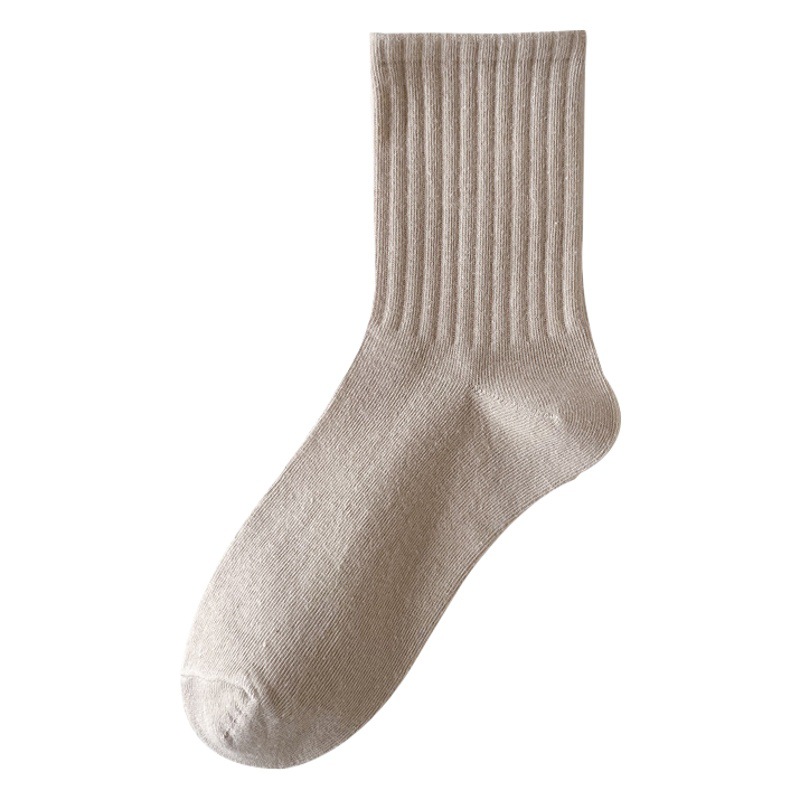 Otoño nuevos calcetines blancos de las mujeres deportes casual alto elástico color sólido media pantorrilla longitud calcetines de algodón negro Zhuji venta al por mayor