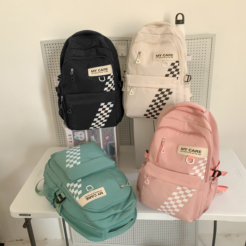 Mochila escolar transfronteriza masculina mochila de estudiante de secundaria para reducir la carga de gran capacidad mochila de computadora de 15,6 pulgadas hembra