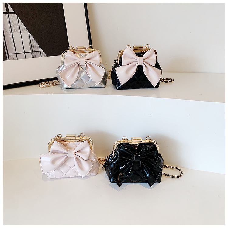 Bolso para niños coreano nuevo estilo comercio exterior rombo bordado clip bolso de hombro para niñas bolso de mensajero para niños con lazo dulce