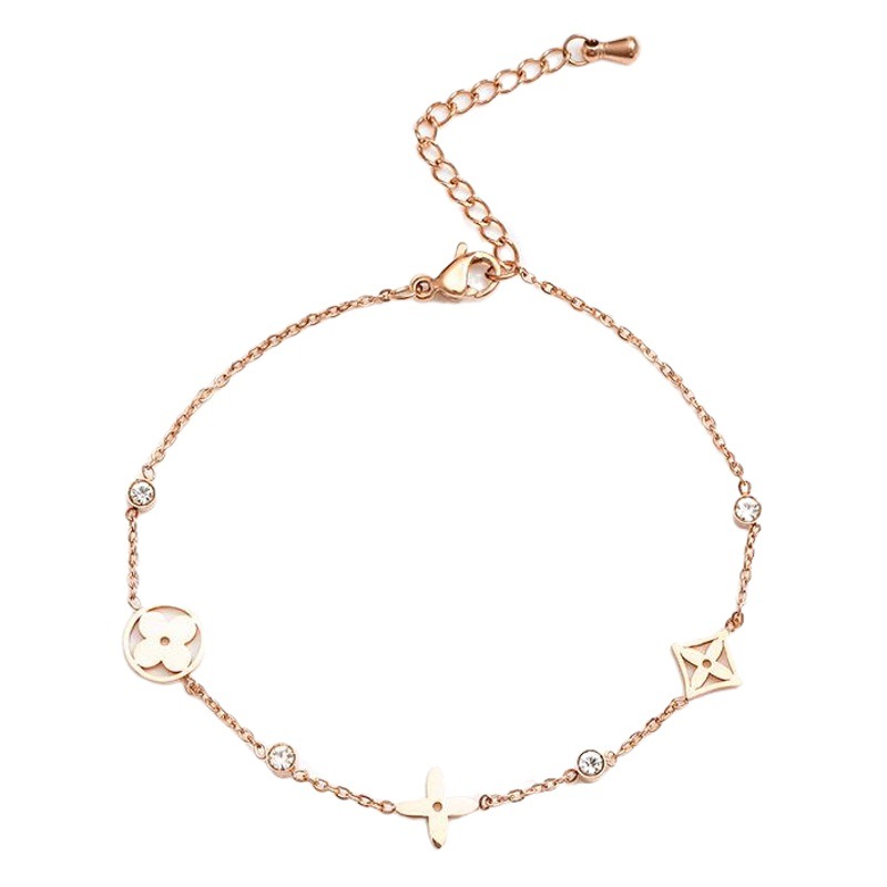 Múltiples huecos de salida afortunado de cuatro hojas de la flor de la pulsera femenina 18K chapado en oro rosa estilo coreano simple de acero de titanio accesorios no se desvanecen