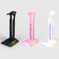 新しいRGBヘッドフォンスタンドの電気競争のイヤホンの変色のスタンドのまぶしい光の双USBのゲームのイヤホンの展示棚