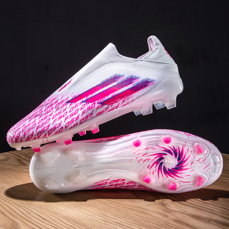 Nuevos zapatos de fútbol juveniles sin costura de tejido sin lazos de entrenamiento de césped profesional zapatos de fútbol transfronterizos al por mayor