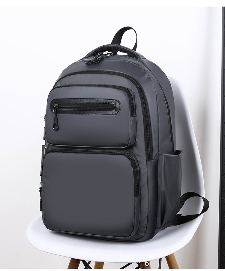 Cross-border wholesale of new large-capacity, simple commuting computer bags, school bags for junior and senior high school students, foreign trade backpacks for men, Korean version undefined