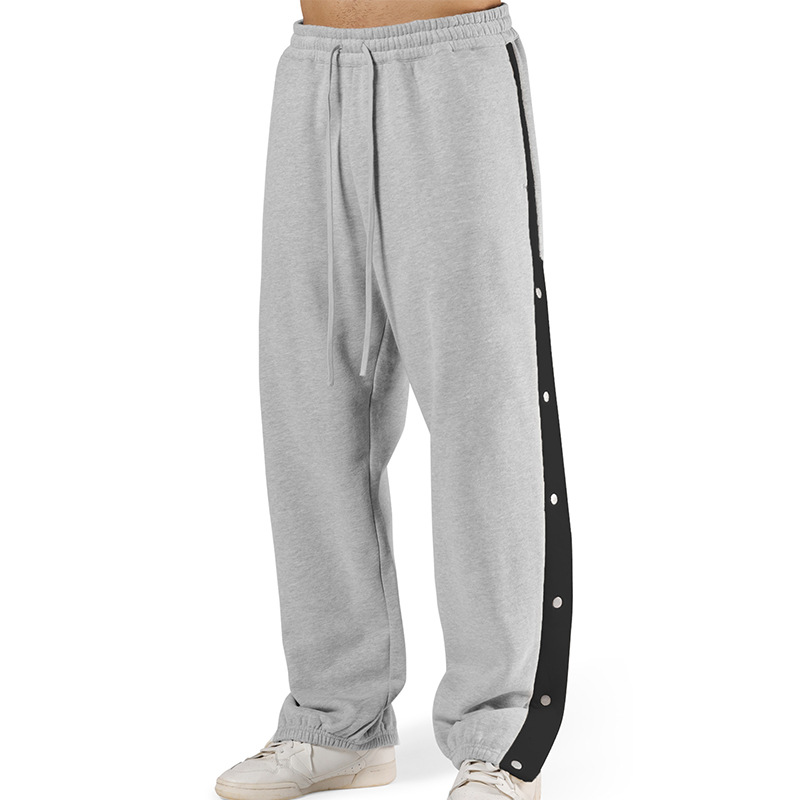 Los deportes de otoño e invierno de los músculos locos están completamente abiertos con hebillas y pantalones de terciopelo. los hombres están relajados y relajados. los pies están atados en otoño e invierno y los pantalones deportivos de terciopelo.