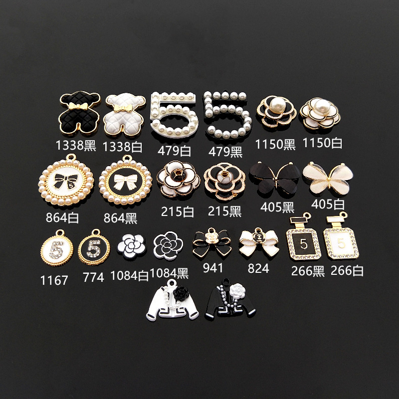 New drop oil inlaid pearl Camellia accessories car bag bow tie phone case beauty alloy accessories