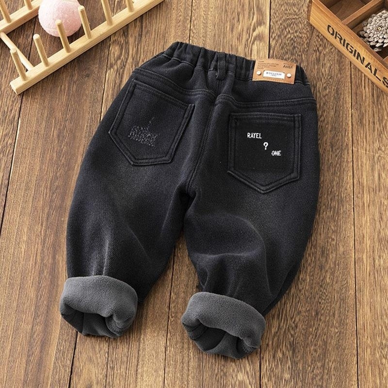 Jeans de lana para niños 2025 nuevos niños pequeños y medianos en invierno engrosado calentamiento de niños pantalones elásticos suaves
