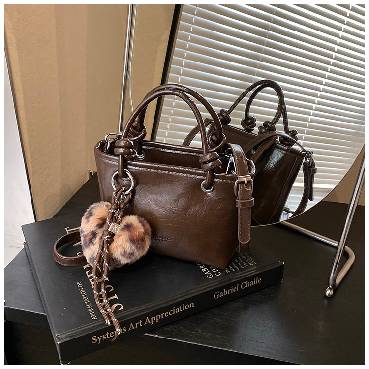 Transfronterizo mayorista otoño invierno retro bolso 2024 nueva moda pu bolso de cubo bolso de nicho universal bolso de mujer