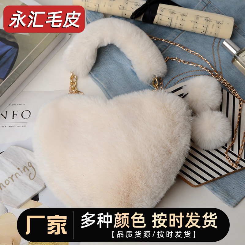 Fabricante en stock bolsa de corazón de melocotón portátil moda felpa en forma de corazón bolsa de peluche bolso de las mujeres