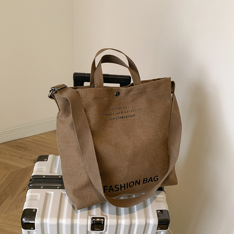 Bolso de lona para mujer, nuevo modelo 2025, gran capacidad, bolso retro para estudiantes, bolso de mano para clase, bolso de hombro, bandolera.