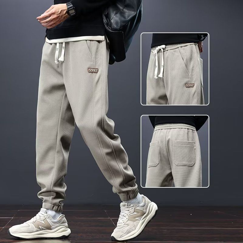 Pantalones de hombre transfronterizos de otoño y invierno, pantalones deportivos sueltos con cordón, pantalones cálidos y casuales más gruesos
