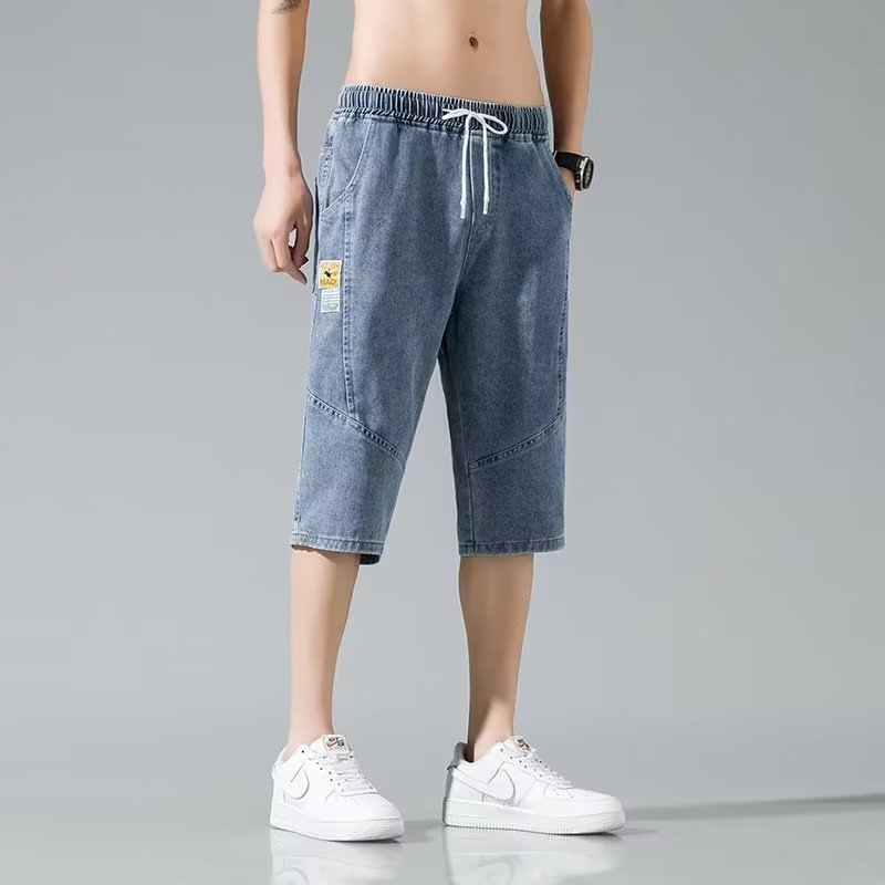 Moda verano mezclilla tendencia de los hombres sueltos rectos tallas grandes pantalones recortados marca de moda de los hombres pantalones medios de 7 puntos estilo fino de verano